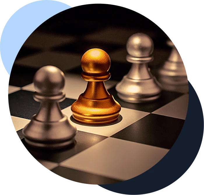 one gold pawn on a chessboard surrounded by silver pawns