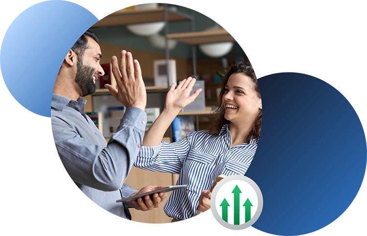 Office workers high-fiving